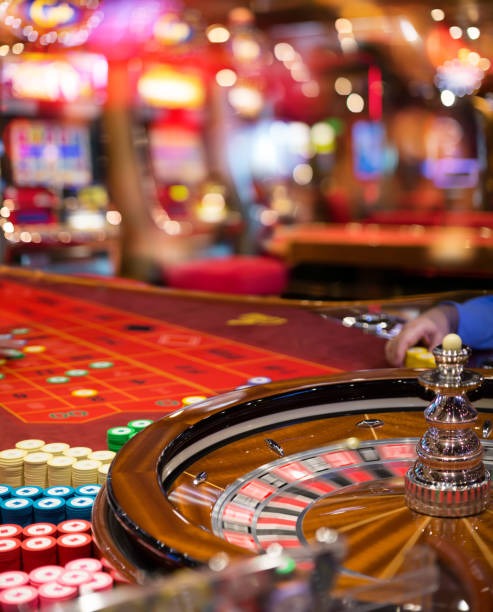 Mobile phone displaying live blackjack dealer from slotbos casino